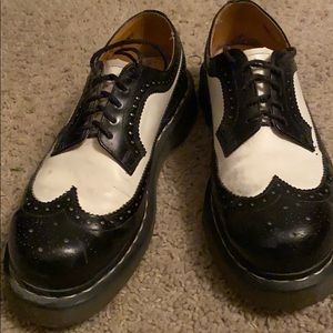 Dr. Martens Black and White Brogue.